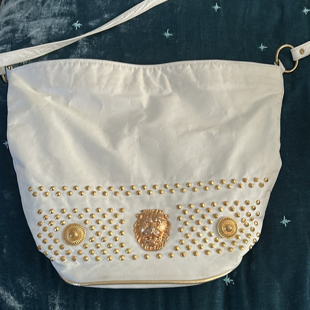 Vintage white leather gold lion studded bucket bag